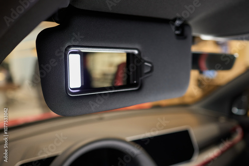 Introducing a Stylish Car Sun Visor with an Illuminated Mirror for chic design and functionality photo