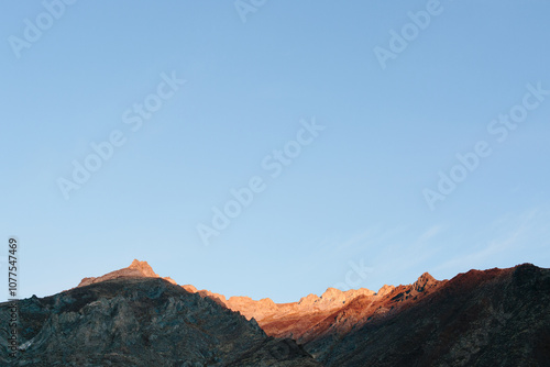 Alpenglow on the mountains photo