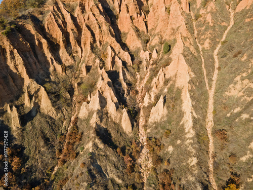 Autumn Sunset view of rock formation Stob pyramids, Bulgaria photo