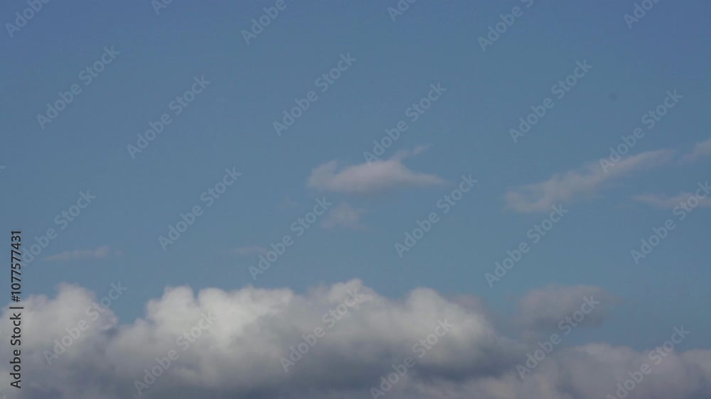 Dynamic Sky Timelapse: Shifting Clouds and Sunlight in a Vast, Ethereal Atmosphere