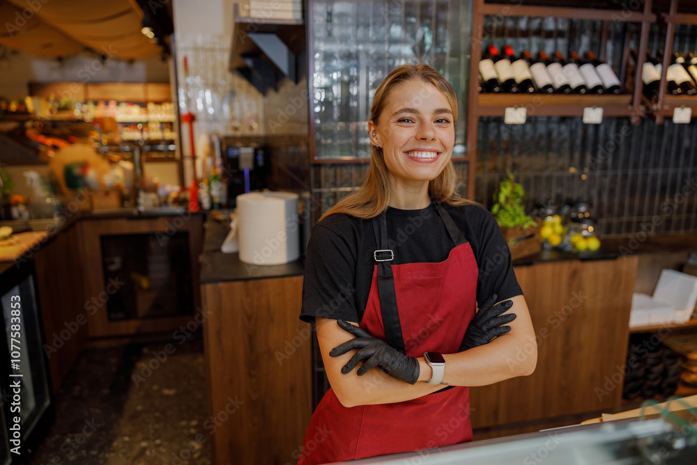 A cheerful barista poses in a caf, showcasing skill and customer service A cheerful barista poses in a caf, showcasing skill and customer service