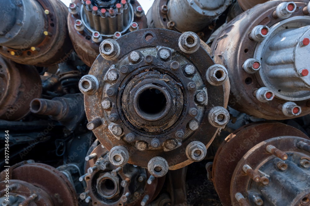 Scrapped truck axles in a scrapyard Scrapped truck axles in a scrapyard