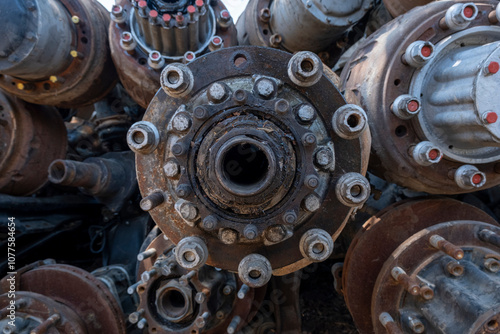 Scrapped truck axles in a scrapyard