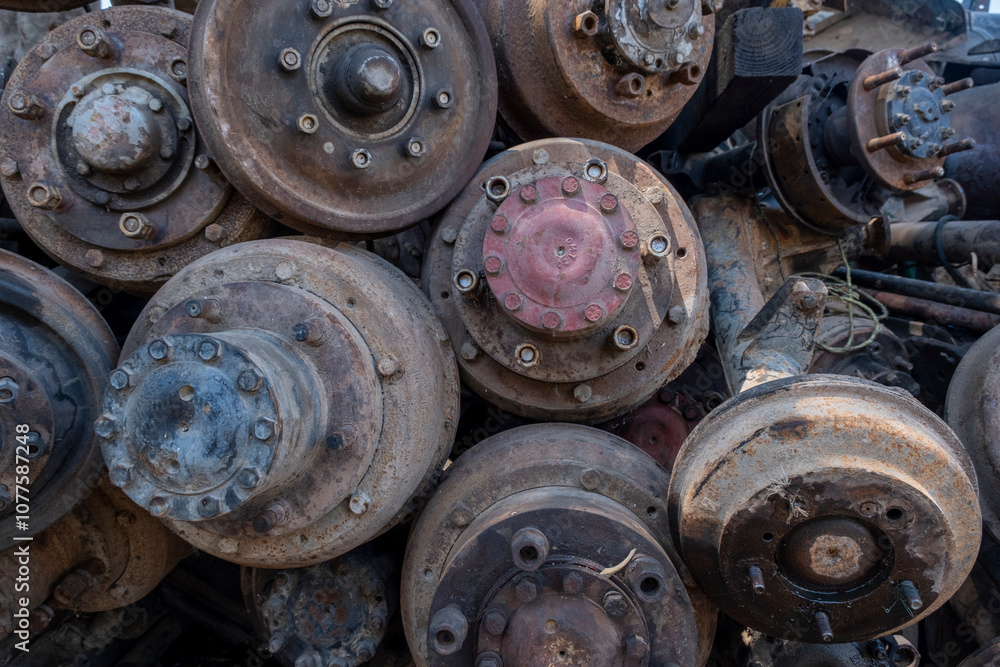 Scrapped truck axles in a scrapyard Scrapped truck axles in a scrapyard