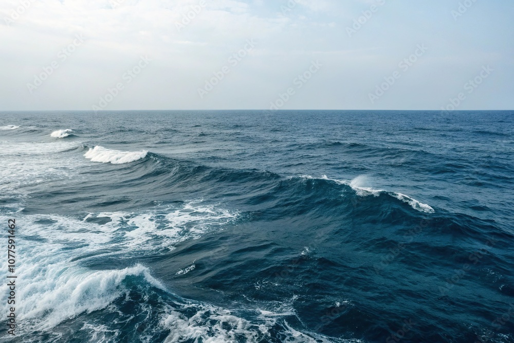 Ocean waves on a calm dark blue ocean surface, wavy lines, ocean, ripples, transparent liquid, fluid motion Ocean waves on a calm dark blue ocean surface, wavy lines, ocean, ripples, transparent liquid, fluid motion