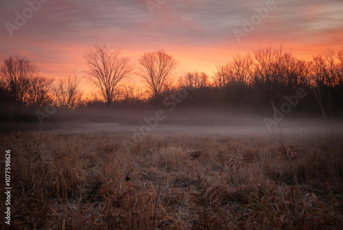 Moody Sunrise in the Foggy Prairie