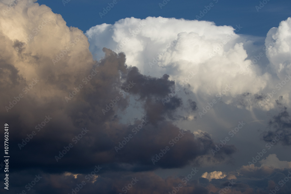 Dramatic sky with heavy rain clouds overlaying white clouds at dusk 4 Dramatic sky with heavy rain clouds overlaying white clouds at dusk 4