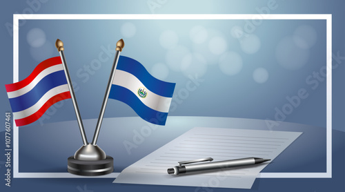 Thailand and El Salvador National flags on small table with bokeh background, cooperative relationship