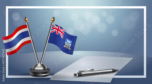 Thailand and Falkland Islands National flags on small table with bokeh background, cooperative relationship