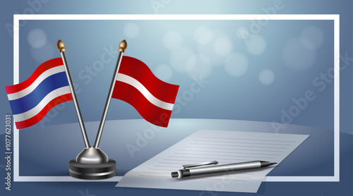 Thailand and Latvia National flags on small table with bokeh background, cooperative relationship