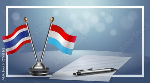 Thailand and Luxembourg National flags on small table with bokeh background, cooperative relationship
