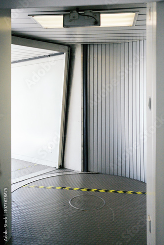 Airport corridor with safety tape across the entryway. photo