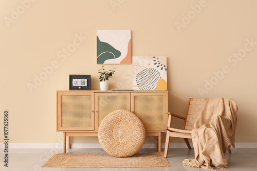 Modern safe, houseplant and...