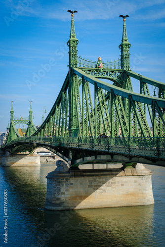 Liberty Bridge spans the Danube River in Budapest, Hungary photo