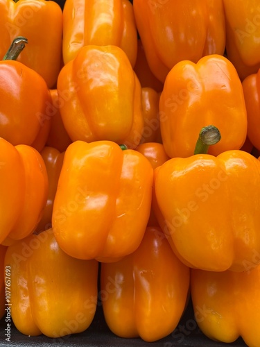 Orange peppers (capsicum) on display 