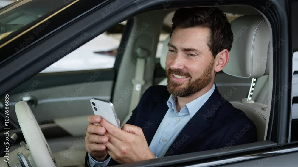 Caucasian man male businessman luxury new car buyer ownership mobile phone smartphone gadget auto transport driver customer chatting automobile online message texting business guy inside technology Caucasian man male businessman luxury new car buyer ownership mobile phone smartphone gadget auto transport driver customer chatting automobile online message texting business guy inside technology