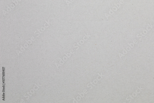 A white background with a grey texture, textured origami paper backdrop