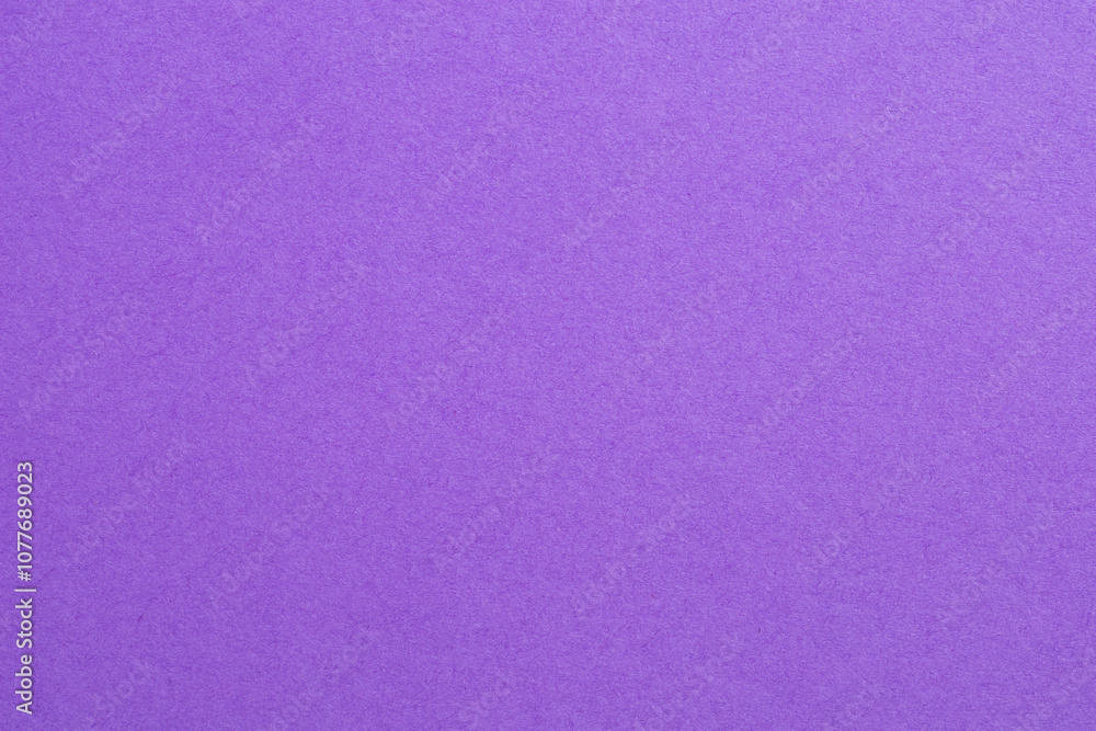 Fototapeta premium A purple background with a white dot in the middle, textured origami paper backdrop
