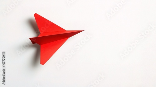 Isolated Paper Airplane on White Background Representing Adventure, Creativity, and Imagination in a Minimalistic Style for Design Projects