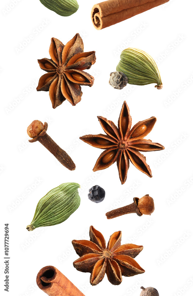 Cloves, cinnamon, anise, cardamom and mix of peppers in air on white background. Set of aromatic spices Cloves, cinnamon, anise, cardamom and mix of peppers in air on white background. Set of aromatic spices