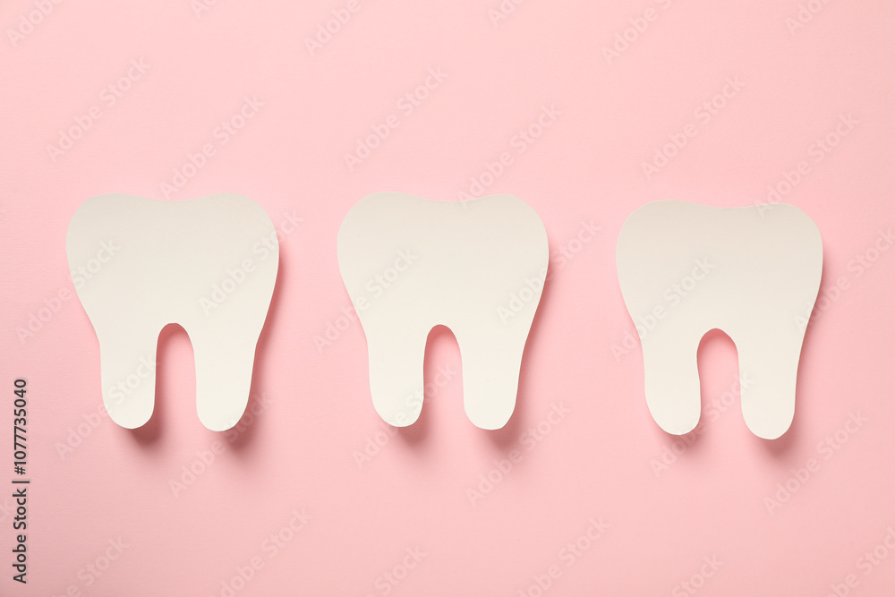 Teeth with dental tools for care, on a pink background. Teeth with dental tools for care, on a pink background.