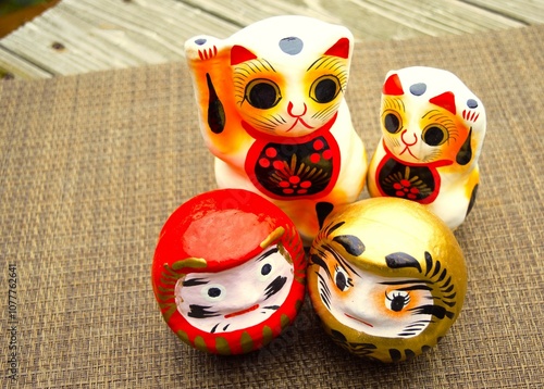 Maneki-neko and Daruma doll,  Japanese figurines photo