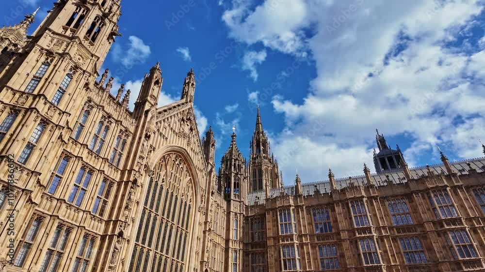 Westminster Palace and Richard Lionheart statue, Low angle with sky in background, panning, London in UK Westminster Palace and Richard Lionheart statue, Low angle with sky in background, panning, London in UK