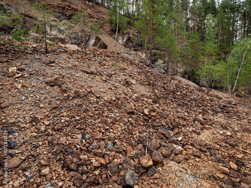 Southern Urals, Bashkir State Nature Reserve: rock dumps at abandoned mines for the extraction of chromite ore under Mount Bashart. photo