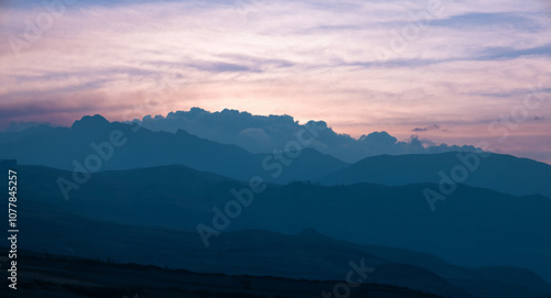 Sacred Valley Valle Sagrado scenic Andes mountains at sunset in Cusco, Peru.