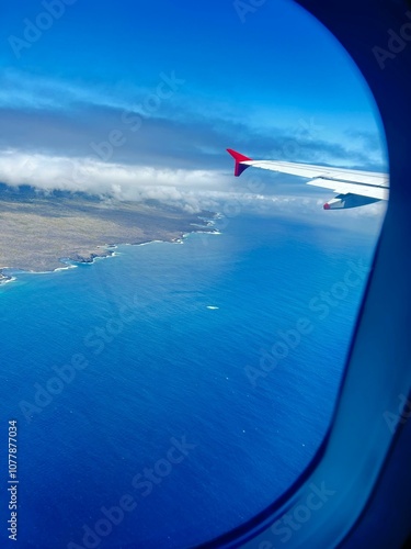 LANDSCAPE OF THE GALAPAGOS ISLANDS FROM THE PLANE WINDOW