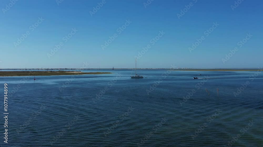 Large Sailboat sailing at Culatra Island - Algarve from Above Large Sailboat sailing at Culatra Island - Algarve from Above
