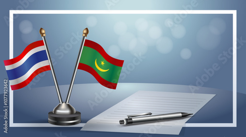 Thailand and Mauritania National flags on small table with bokeh background, cooperative relationship