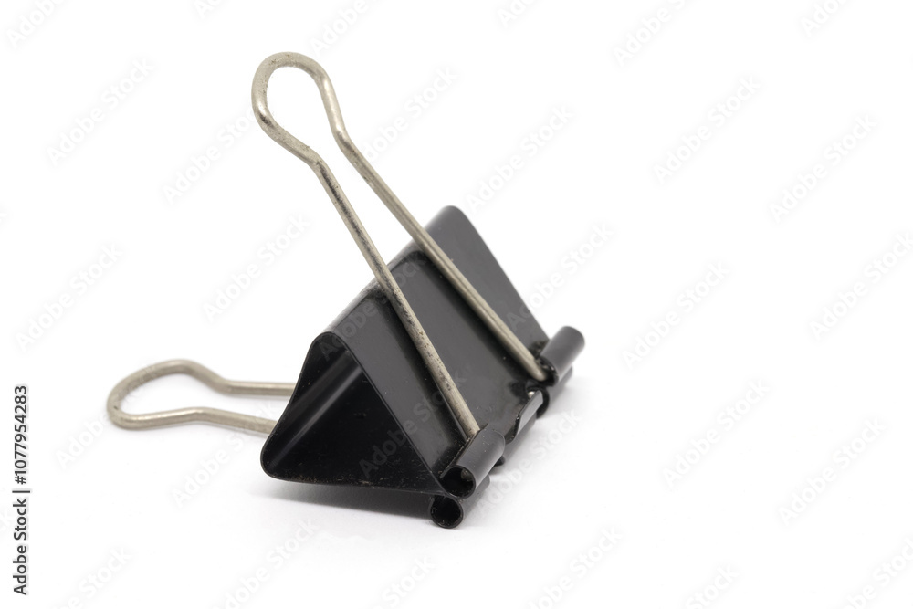 Close-Up of a Black Binder Clip on White Background Close-Up of a Black Binder Clip on White Background