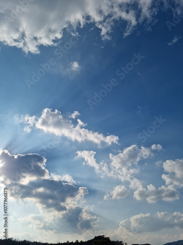  Blue sky and white puffy clouds