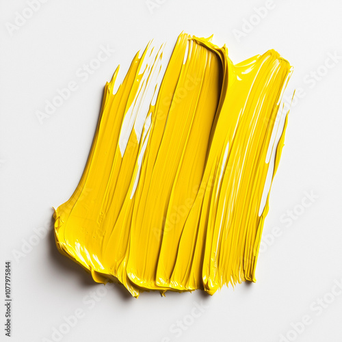 yellow paint brush stroke on a clean white background, showcasing vibrant color and expressive texture. Ideal for stock use in design, art projects, or marketing visuals, symbolizing creativity, energ photo