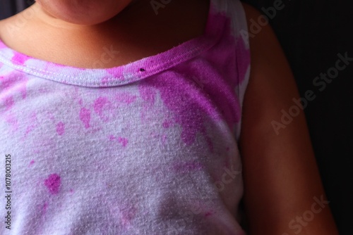 Wallpaper Mural Asian girl's clothes dirty after eating dragon fruit, close up. Torontodigital.ca