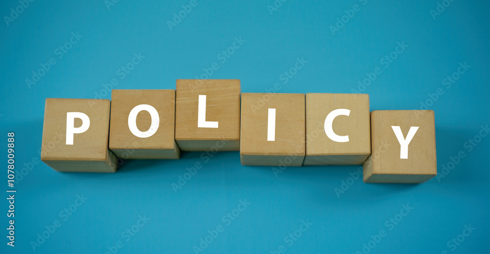POLICY Concept Words on wooden blocks. Idea for healthcare, typography, medical, business and financial concept. Copy space for mockup, marketing and background POLICY Concept Words on wooden blocks. Idea for healthcare, typography, medical, business and financial concept. Copy space for mockup, marketing and background