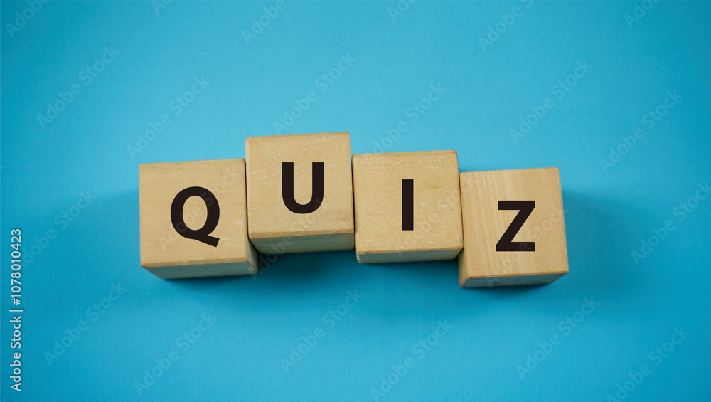 QUIZ word. Concept BLOG words on wooden blocks with dart board. Idea for healthcare, typography, medical, business and financial concept. Copy space for mockup. QUIZ word. Concept BLOG words on wooden blocks with dart board. Idea for healthcare, typography, medical, business and financial concept. Copy space for mockup.