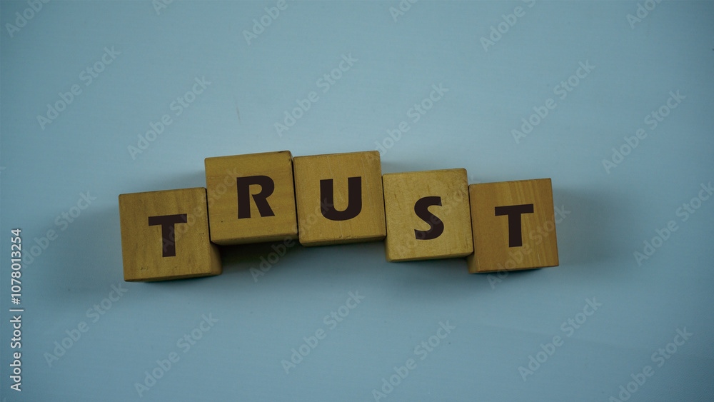 TRUST Concept Words on wooden blocks. Idea for healthcare, typography, medical, business and financial concept. Copy space for mockup, marketing and background TRUST Concept Words on wooden blocks. Idea for healthcare, typography, medical, business and financial concept. Copy space for mockup, marketing and background