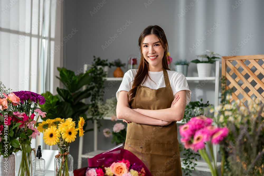Portrait of florist woman completing beautiful bouquet in flower shop. Portrait of florist woman completing beautiful bouquet in flower shop.