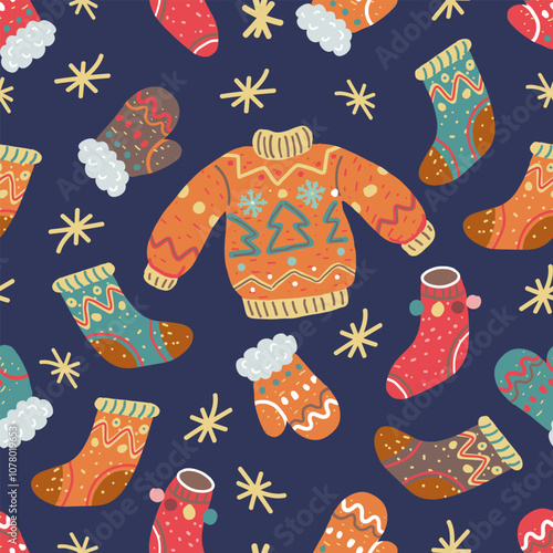 Winter clothes seamless pattern. Jumper, socks, gloves on blue background. Christmas ugly sweater and warm clothing ornament.