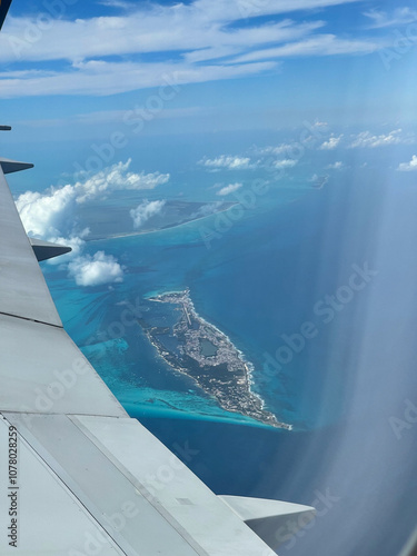Aerial View of Tropical Island from Airplane Window