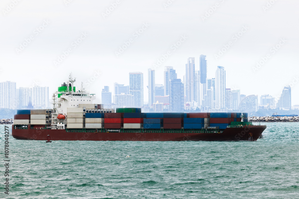 Obraz premium shipping logistic cargo container ship in sea import export goods and distributing products to dealer and consumers across worldwide, by container ship transport business, industry delivery service. 