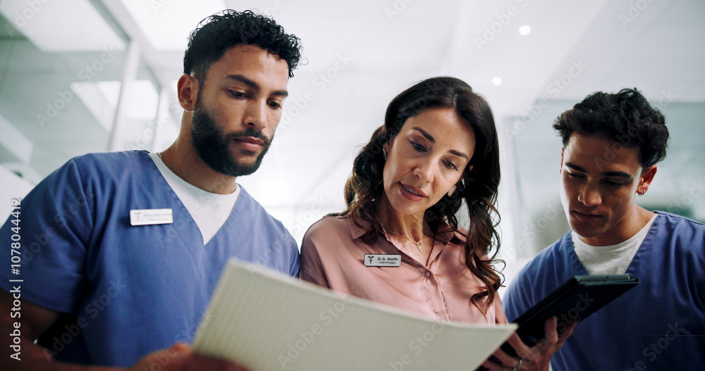 © peopleimages.com - Hospital chief, documents and planning with doctors and woman for consultant, schedule and feedback. Teamwork, advice and medical with people in clinic for healthcare compliance, nurse and insurance