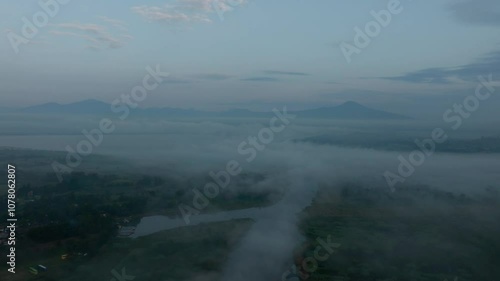 Wallpaper Mural DRONE: REVEAL SHOT OF JANITZIO ISLAND AT SUNRISE WITH MIST Torontodigital.ca