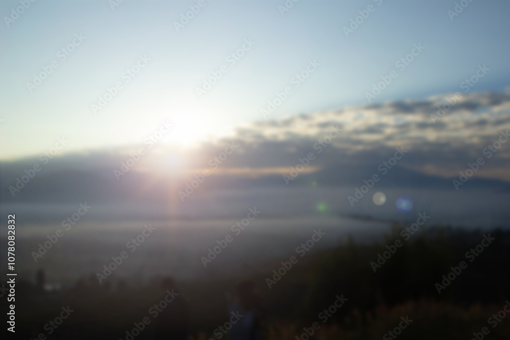 Abstract blurring warm colors and bright sunlight. Bokeh or merry christmas winter background, happy new year 2025. Green forest nature, sky sunny light patterns evening clouds blur in Navidad. Abstract blurring warm colors and bright sunlight. Bokeh or merry christmas winter background, happy new year 2025. Green forest nature, sky sunny light patterns evening clouds blur in Navidad.