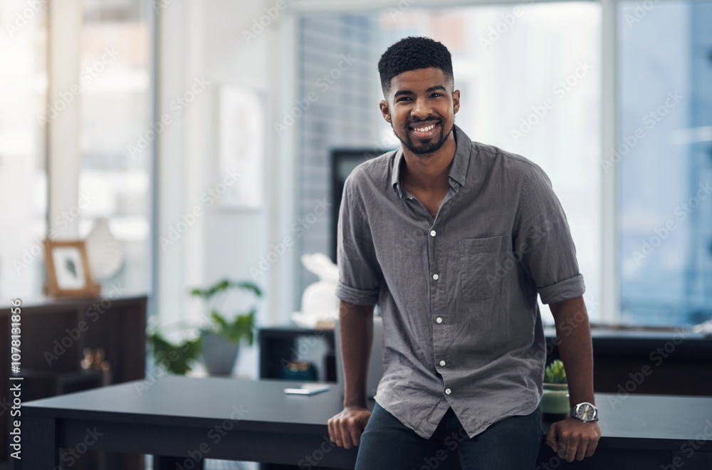 Business portrait, smile and black man in creative office for career, job opportunity or work at startup. Happy, confidence and African professional, entrepreneur or social media marketer in Rwanda Business portrait, smile and black man in creative office for career, job opportunity or work at startup. Happy, confidence and African professional, entrepreneur or social media marketer in Rwanda