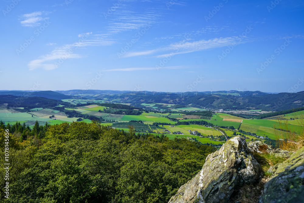 View of the landscape near Bruchhauser Steine in the Sauerland near Olsberg. Nature at Istenberg on the Rothaargebirge.
View of the landscape near Bruchhauser Steine in the Sauerland near Olsberg. Nature at Istenberg on the Rothaargebirge.