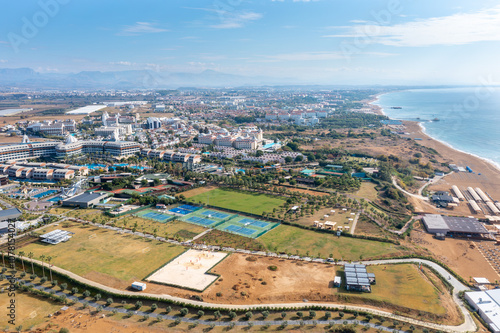 Gündoğdu holiday tourist region. Summer vacation on beach, Hotels sea, beach, coast, sports fields, water sports and sun. Drone Aerial view. Mediterranean,  Manavgat - Alanya – TURKEY