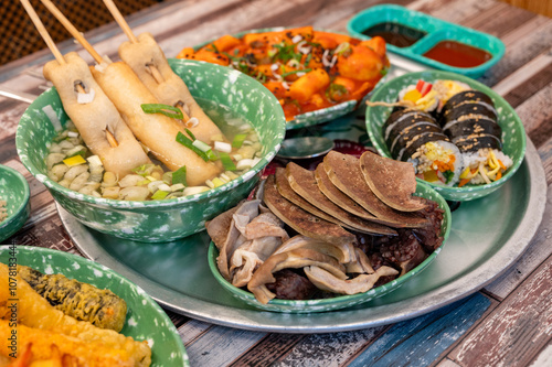 Korean food. Snacks (Tteokbokki, fish cake, gimbap, sundae) photo